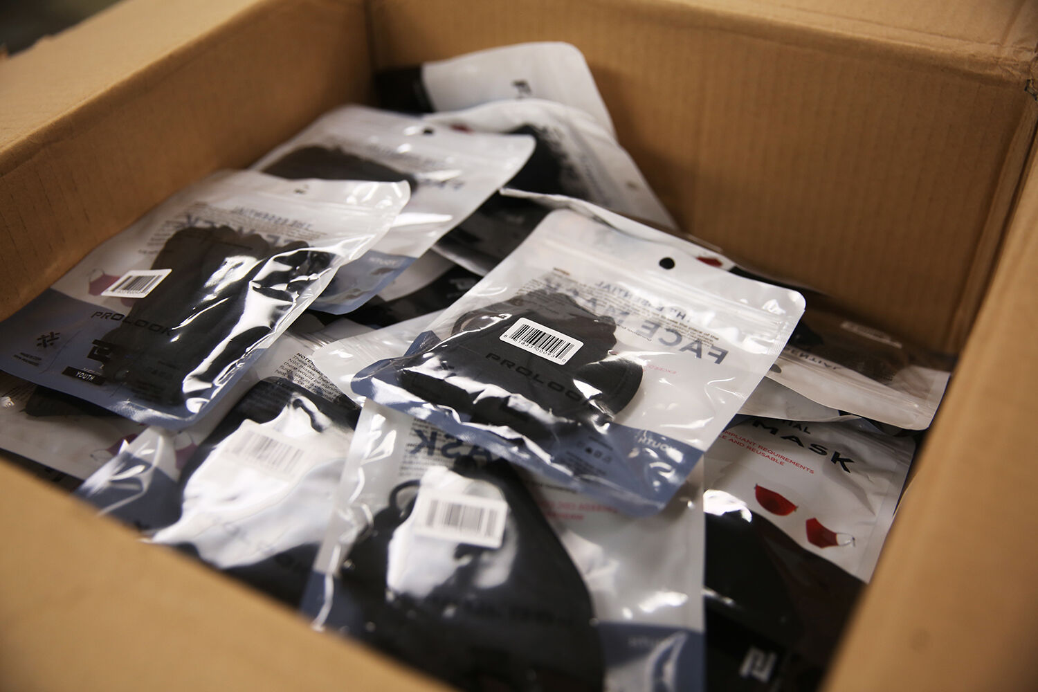 A box of extra masks sits in the office of Clear Creek Middle School